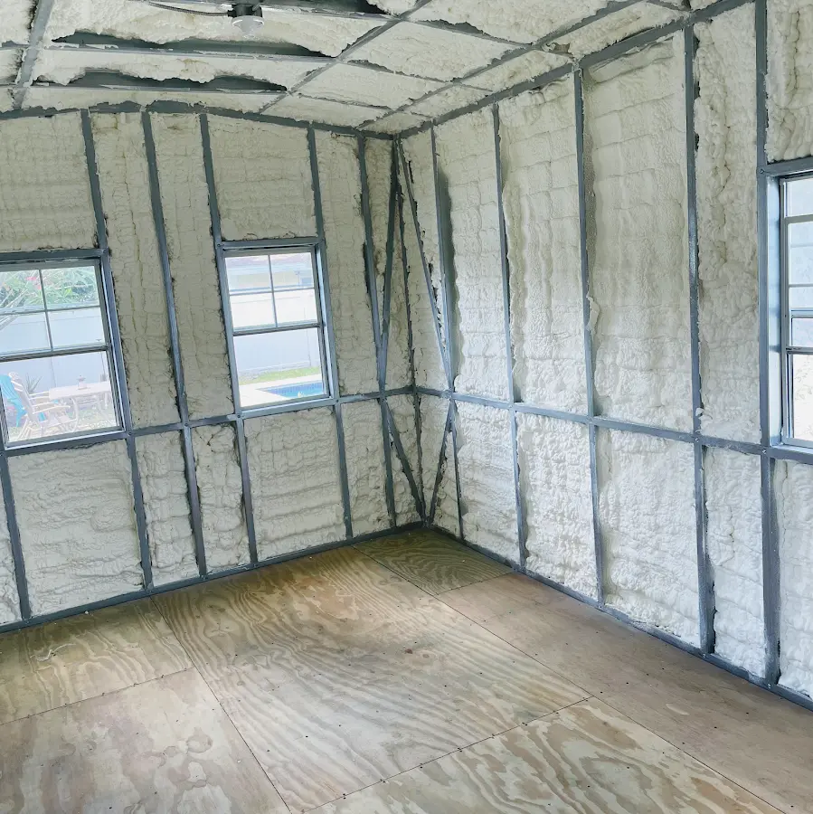 Closed-cell spray foam insulation applied to wall cavities in a residential project in Cazenovia